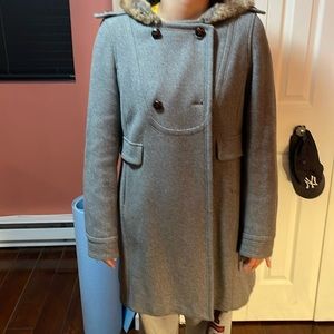 Gray knee length winter coat with hooded fur